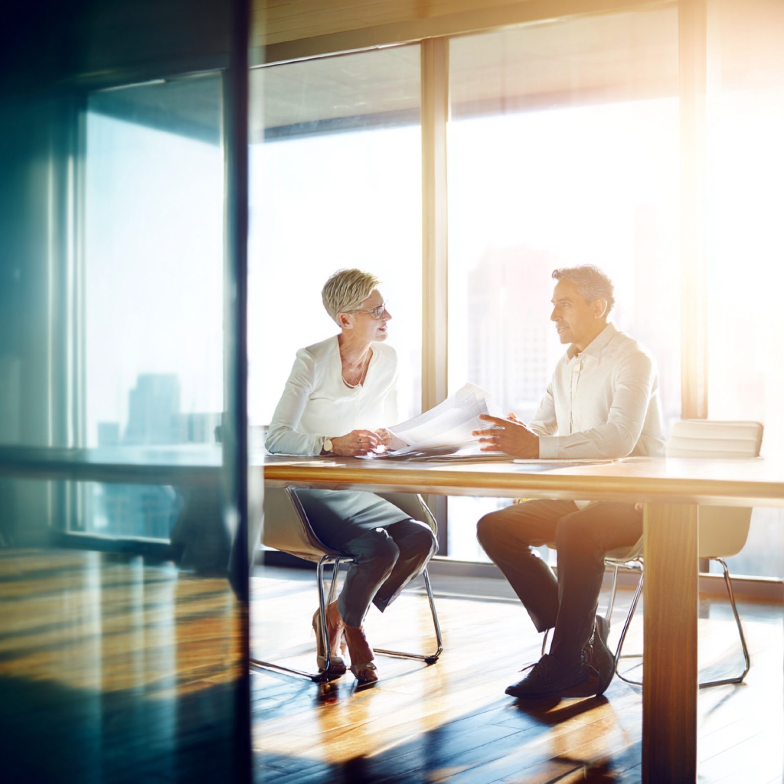 NOVAIQ practitioner in client strategy conversation